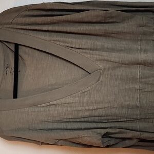 Olive colored Natural Life oversized romper. Jogger style